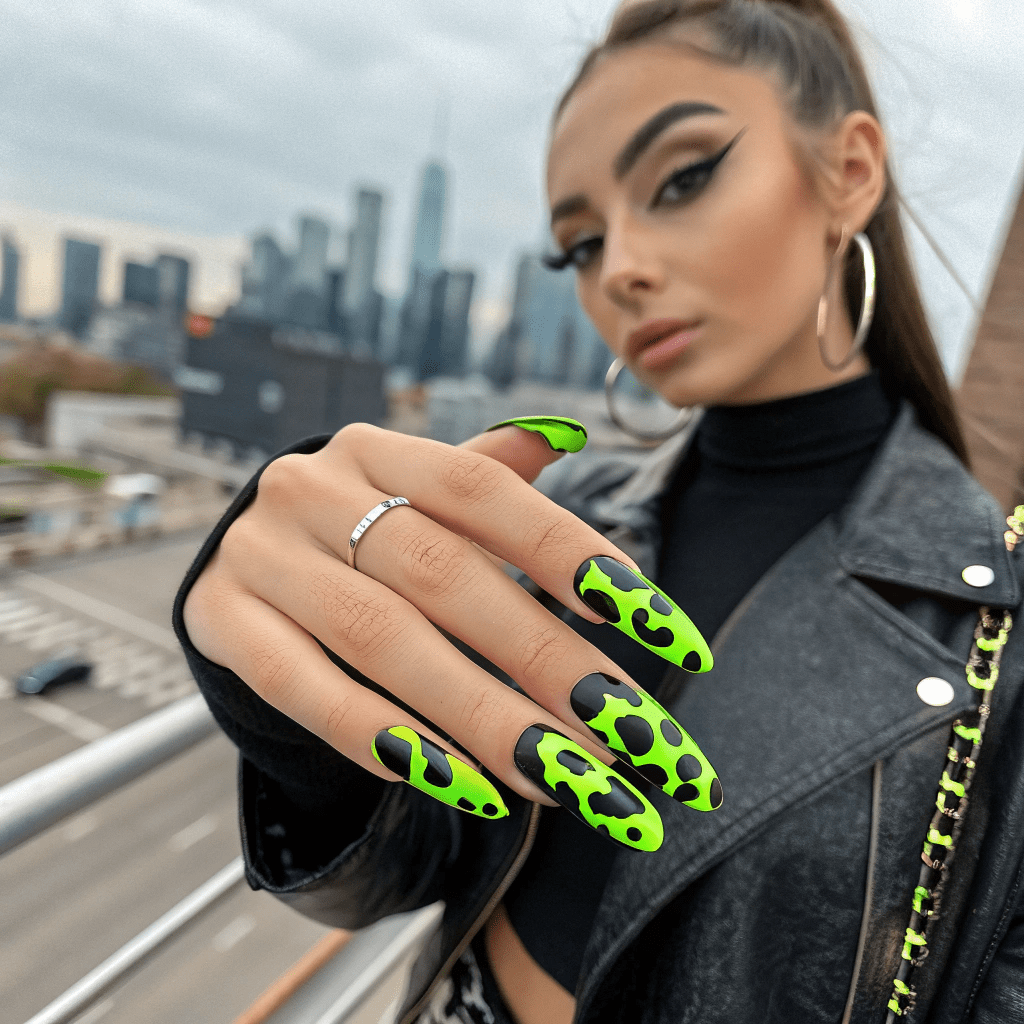 with black and neon green cow  with black and neon green cow