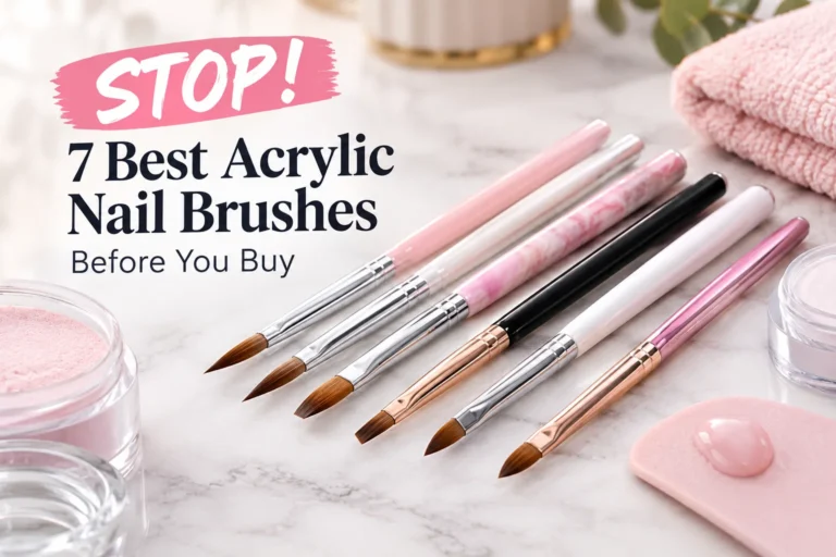 Seven acrylic nail brushes with pink, white, black, and marble-patterned handles arranged on a white marble surface.